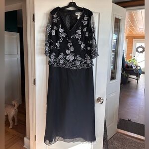 Dela-Jo By Lida Gown
Black
Size 18